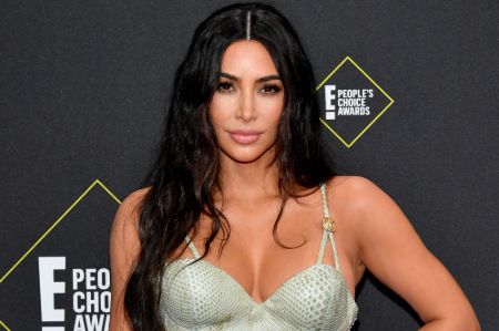 Kim Kardashian is doing fine without Kanye West.